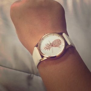 White and gold pineapple watch